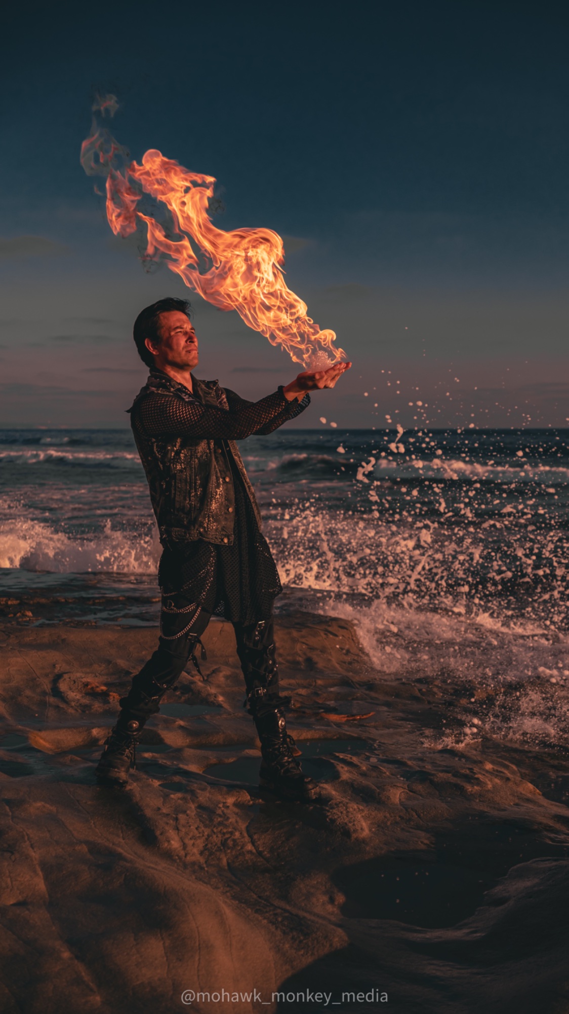 Fire breathing at sunset